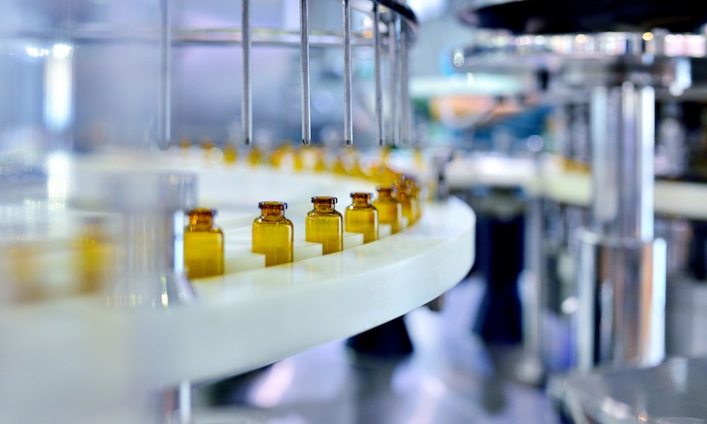 Brown Glass Bottle Filling at Production Line
