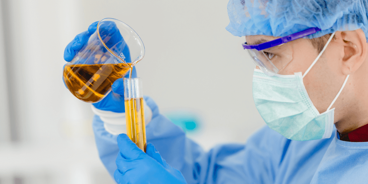 A lab technician carefully analyzes petroleum samples