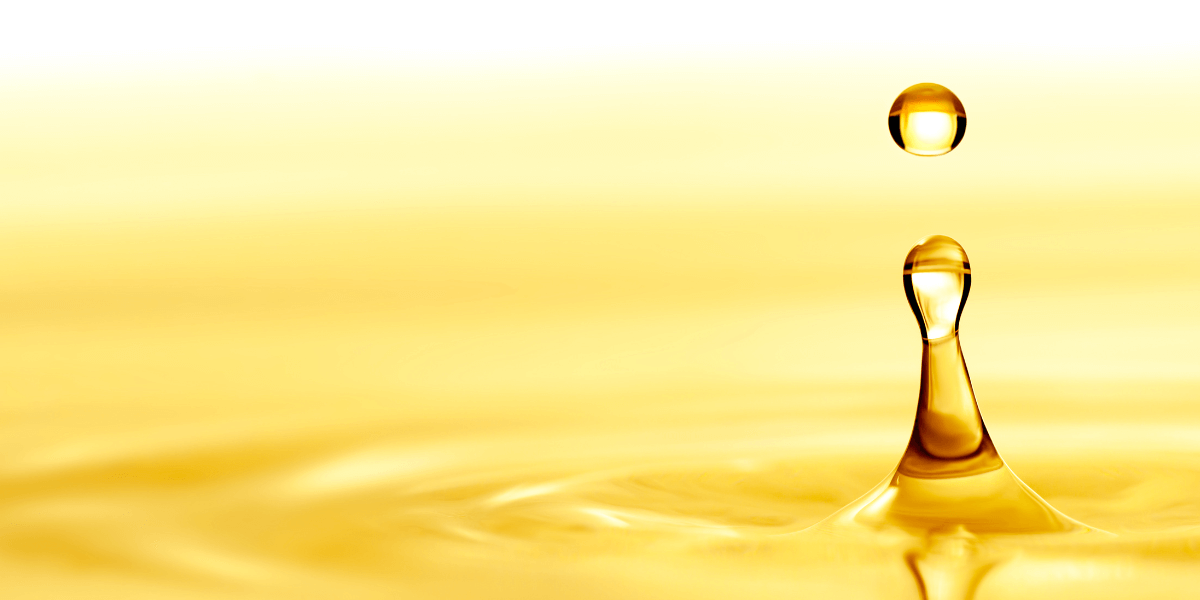 A perfect drop of golden liquid